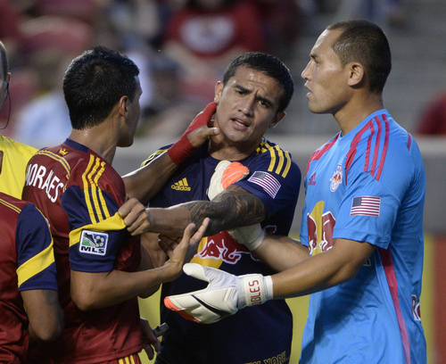 Rick Egan  |  The Salt Lake Tribune

Real Salt Lake midfielder Javier Morales (11) gets mixed up with New York Red Bulls midfielder Tim Cahill (17) and New York Red Bulls goalkeeper Luis Robles (31), in MLS action at Rio Tinto Stadium, Wednesday, July 30, 2014