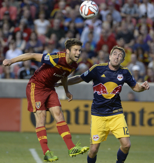 Rick Egan  |  The Salt Lake Tribune

Real Salt Lake defender Chris Wingert (17) goes after the ball along with New York Red Bulls midfielder Eric Alexander (12), in MLS action at Rio Tinto Stadium, Wednesday, July 30, 2014