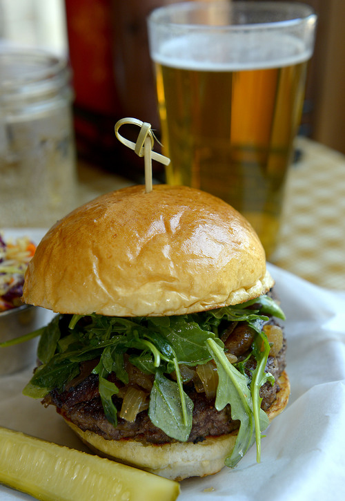 Leah Hogsten  |  The Salt Lake Tribune
The Lux Burger with foie gras, truffle, bourbon carmelized onions and arugula, $32. Burgers & Bourbon, a restaurant inside the Montage Deer Valley that specializes in hamburgers and bourbon, July 25, 2014.