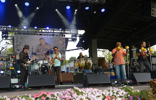 Leah Hogsten  |  The Salt Lake Tribune
Legendary musician Carlos Santana and his band members perform a sold out show at Red Butte Garden, July 29, 2014.