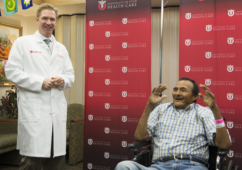 Rick Egan  |  The Salt Lake Tribune

Dr. Jeff Campsen, surgical director of kidney transplants at the University of Utah (left) talks about Andres Galvan's kidney transplant, which is believed to be the first kidney transplant in Utah using an organ from a donor with hepatitis C and into a patient with hepatitis C. Thursday, July 31, 2014