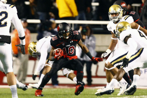 Chris Detrick  |  The Salt Lake Tribune
Utah Utes wide receiver Delshawn McClellon (10) runs past UCLA Bruins linebacker Stan McKay (4) during the first half of the game at Rice-Eccles Stadium Thursday October 3, 2013. UCLA is winning the game 21-17.