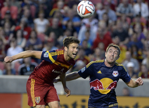 Rick Egan  |  The Salt Lake Tribune

Real Salt Lake defender Chris Wingert (17) goes after the ball along with New York Red Bulls midfielder Eric Alexander (12), in MLS action at Rio Tinto Stadium, Wednesday, July 30, 2014