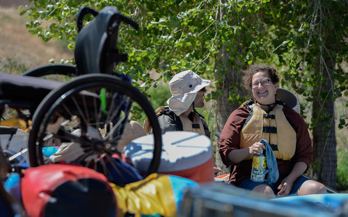 Francisco Kjolseth  |  The Salt Lake Tribune
Kenneth Robertson and Sara Rose Tannenbaum are ready to float down the river once again while the SPLORE crew packs up the last of the gear.