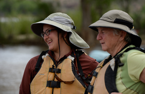Francisco Kjolseth  |  The Salt Lake Tribune
Excitement builds as Sara Rose Tannenbaum, left, and volunteer Pat Burg watch the crew ready boats for a float trip down the Colorado River with SPLORE recently.