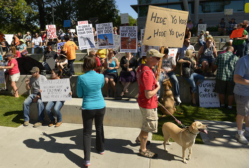 Leah Hogsten  |  The Salt Lake Tribune
Hundreds of supporters of Sean Kendall and his dog, Geist, who was shot and killed in his backyard by a Salt Lake City police officer during a search for a missing child, rally to protest the officer's action, Saturday, June 28, 2014 at the SLC Police headquarters.