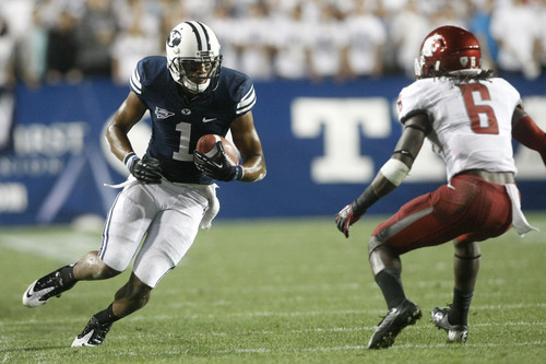 Chris Detrick  |  The Salt Lake Tribune
Brigham Young Cougars wide receiver Ross Apo (1) runs the ball past Washington State Cougars cornerback Damante Horton (6) during the first half of the game against Washington State at LaVell Edwards Stadium Thursday August 30, 2012. BYU is winning the game 24-6.