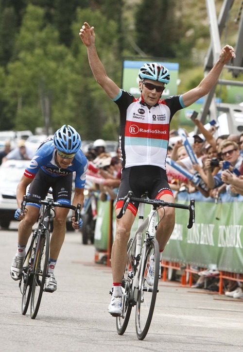 Leah Hogsten | The Salt Lake Tribune
Chris Horner,  raises his hands in victory with rider Tom Danielson on his heels at the finish of stage 5  or the "Queen" stage of the Tour of Utah, a full 113 miles, starting at Snowbasin Resort and ending at Snowbird Ski and Summer Resort, Saturday, August 10, 2013.