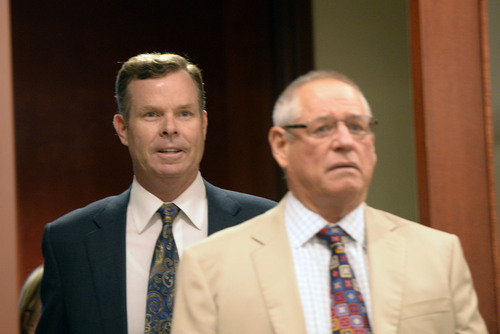 Al Hartmann  |  The Salt Lake Tribune 
Former Attorney General John Swallow, left, and his attorney Stephen McCaughey enter Judge Royal Hansen's courtroom in Salt Lake City Wednesday July 30.  Swallow along with former attorney general Mark Shurtleff are charged with receiving or soliciting bribes, accepting gifts, tampering with evidence, obstructing justice and participating in a pattern of unlawful conduct.