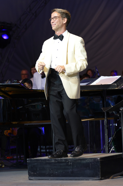Leah Hogsten  |  The Salt Lake Tribune
Conductor Jerry Steichen leads the Utah Symphony and four singers  as they perform classics from the Disney songbook during a Deer Valley Music Festival's  "Disney in Concert: Tale as Old as Time" performance,  August 1, 2014. The evening will feature the orchestra and four singers -- Anthony Apicella, Terron Brooks, Juliana Hansen and Arielle Jacobs -- as they perform numbers from the Disney songbook, ranging from songs from the smash hit "Frozen" to a 1935 animated short of Mickey Mouse in "The Band Concert," set to Rossini's "William Tell" Overture.