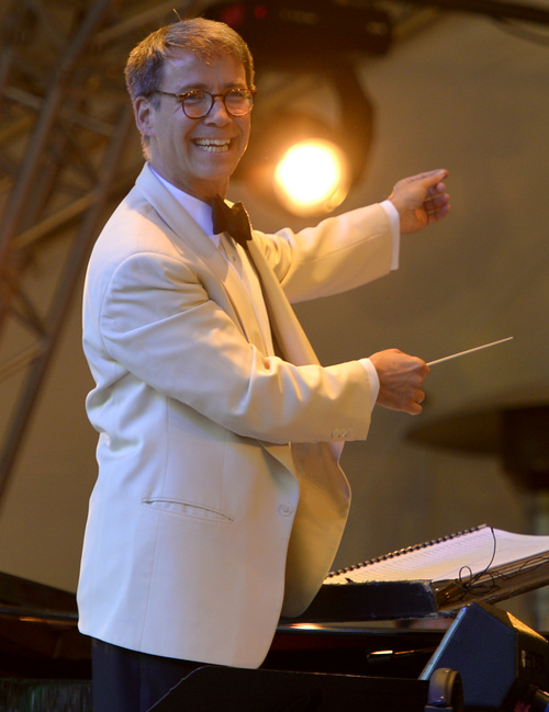 Leah Hogsten  |  The Salt Lake Tribune
Conductor Jerry Steichen leads the Utah Symphony and four singers  as they perform classics from the Disney songbook during a Deer Valley Music Festival's  "Disney in Concert: Tale as Old as Time" performance,  August 1, 2014. The evening featured the orchestra and four singers -- Anthony Apicella, Terron Brooks, Juliana Hansen and Arielle Jacobs -- as they performed numbers from the Disney songbook, ranging from songs from the smash hit "Frozen" to a 1935 animated short of Mickey Mouse in "The Band Concert," set to Rossini's "William Tell" Overture.