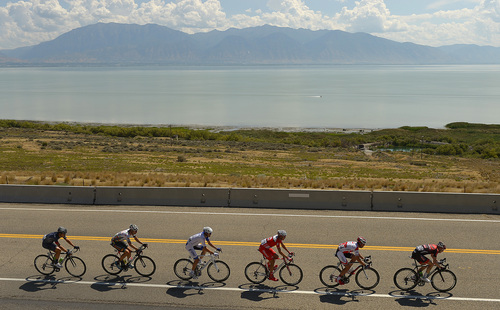 Leah Hogsten  |  The Salt Lake Tribune
 2014 Tour of Utah leading cyclists pass by Utah Lake near Pelican Point during Wednesday's 118.3-mile stage from Lehi to Miller Motorsports Park in Tooele, August 6, 2014.