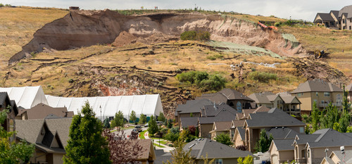 Trent Nelson  |  The Salt Lake Tribune
A large landslide in North Salt Lake destroyed one home and caused the evacuation of dozens more, Tuesday August 5, 2014.