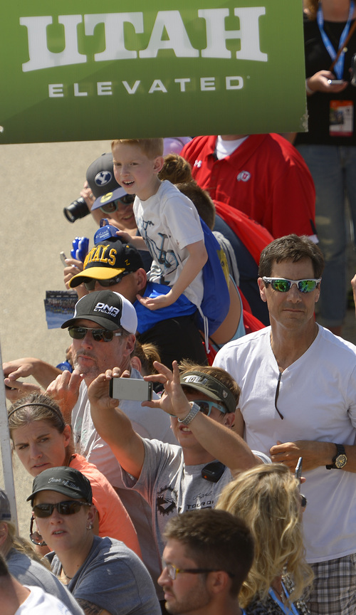 Leah Hogsten  |  The Salt Lake Tribune
 Fans watch as 2014 Tour of Utah cyclists make their final three laps of the day at Miller Motorsports Park during Wednesday's 118.3-mile stage from Lehi to Miller Motorsports Park in Tooele, August 6, 2014.