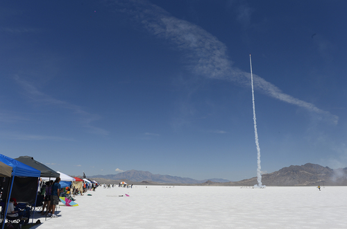 Scott Sommerdorf   |  The Salt Lake Tribune
One of many rockets launched Saturday pierces the sky during the Utah Rocket Club's "Hellfire" event. It  draws rocket hobbyists from throughout the United States. It is free to the public, each year attracting a sizable crowd of spectators, Saturday, Aug. 2, 2014.