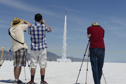Scott Sommerdorf   |  The Salt Lake Tribune
Spectators watch one of many launches at the Utah Rocket Club's "Hellfire" event which draws rocket hobbyists from throughout the United States, Saturday, Aug. 2, 2014.