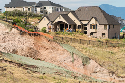 Trent Nelson  |  The Salt Lake Tribune
A large landslide in North Salt Lake that destroyed one home and caused the evacuation of dozens more, Tuesday August 5, 2014.