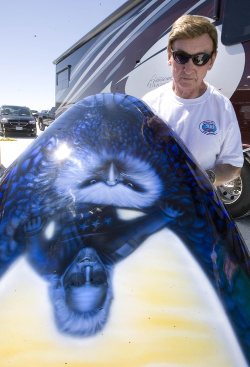 Paul Fraughton  |   Salt Lake Tribune
   Driver of The Turbinator, Dave Spangler lifts the nose of the car sporting the image of the late  Don Vesco  who drove the Turbinator setting  the world speed record for a wheel driven vehicle in 2001 at 478 MPH.                       
 Tuesday, August 13, 2013