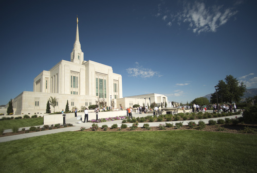 Rick Egan  |  The Salt Lake Tribune
Guests take photos and explore the grounds of the Ogden Temple, on the first day of the public open house on Friday. The temple will be formally rededicated in three sessions on Sunday.