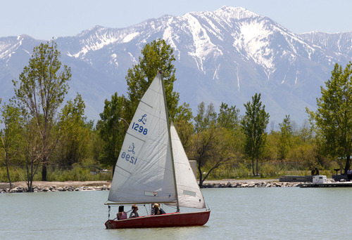 Al Hartmann  |  The Salt Lake Tribune
Folks take their small sailboat onto Utah Lake on May 15, 2012.