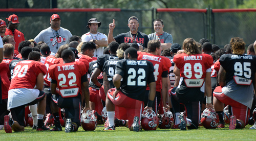 Francisco Kjolseth  |  The Salt Lake Tribune
Utah coach Kyle Whittingham speaks with the team as the Utes complete week one of practice with all pads.