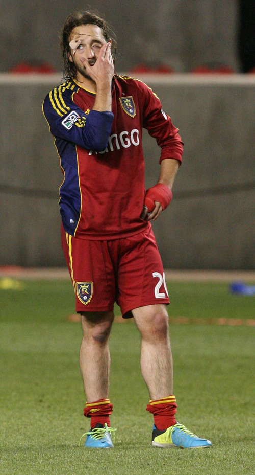 Leah Hogsten | The Salt Lake Tribune
Real Salt Lake midfielder Ned Grabavoy (20) reacts to the loss.  Real Salt Lake lost the 2013 U.S. Open Cup Final to D.C. United 1-0 at Rio Tinto Stadium in Sandy, Utah, Tuesday, October 1, 2013. The winner will play in the CONCACAF Champions League.