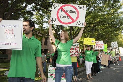 Rick Egan  |  The Salt Lake Tribune

Opponents of Utah's Common Core protest  outside the State Board of Education meeting, Friday, August 8, 2014