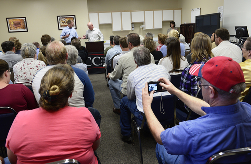 Scott Sommerdorf   |  The Salt Lake Tribune
UEP fiduciary Bruce Wisan and UEP attorney Jeff Shields are at the main table as an overflow crowd of about 90 people pack a small meeting room at Mohave Community College in Colorado City to discuss the UEP distribution, Saturday, August 9, 2014.
