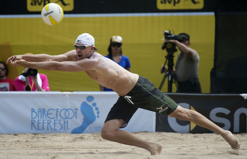 Steve Griffin  |  The Salt Lake Tribune


Jake Gibb dives for a ball during championship match in the AVP Professional Beach Volleyball Tournament at Liberty Park in Salt Lake City, Sunday, August 10, 2014.