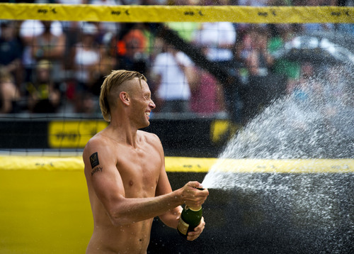 Steve Griffin  |  The Salt Lake Tribune


Casey Patterson sprays champaign after he and team mate Jake Gibb won the championship match in the AVP Professional Beach Volleyball Tournament at Liberty Park in Salt Lake City, Sunday, August 10, 2014.