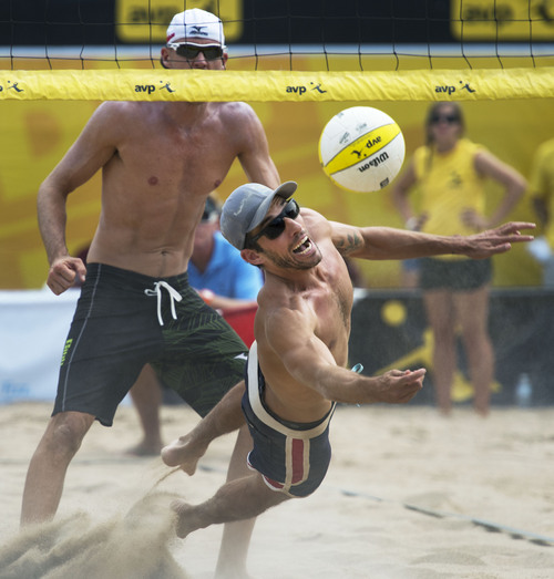 Steve Griffin  |  The Salt Lake Tribune


Nick Lucena dives after a shot from Jake Gibb during the AVP Professional Beach Volleyball Tournament at Liberty Park in Salt Lake City, Sunday, August 10, 2014.