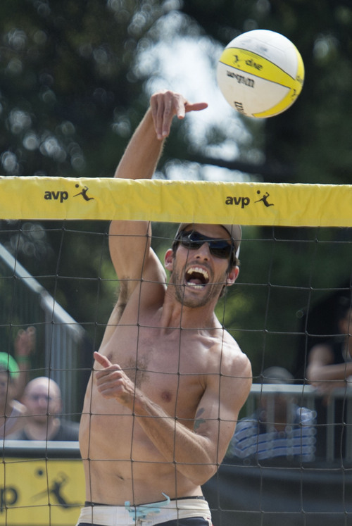 Steve Griffin  |  The Salt Lake Tribune


Nick Lucena spikes the ball during the AVP Professional Beach Volleyball Tournament at Liberty Park in Salt Lake City, Sunday, August 10, 2014.