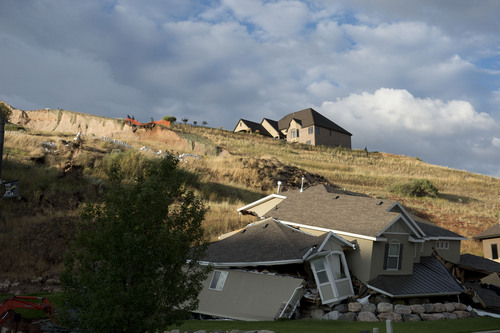 Jeremy Harmon  |  The Salt Lake Tribune

This home at 739 Parkway Drive in North Salt Lake was destroyed by a landslide early in the morning on Tuesday, August 5, 2014.
