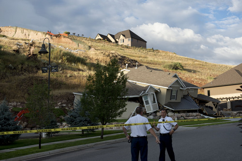 Jeremy Harmon  |  The Salt Lake Tribune

This home at 739 Parkway Drive in North Salt Lake was destroyed by a landslide on Tuesday, Aug. 5, 2014.