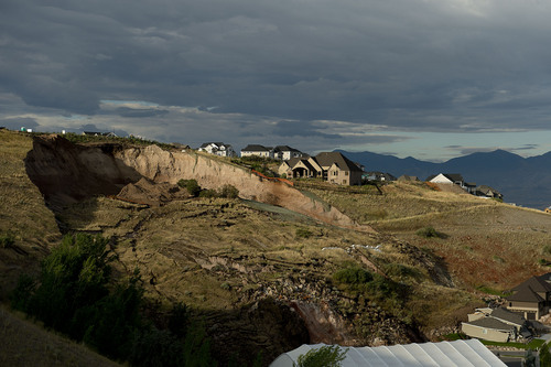 Jeremy Harmon  |  The Salt Lake Tribune

A huge scar from a landslide is seen above 739 Parkway Drive in North Salt Lake where a home was destroyed early in the morning on Tuesday, August 5, 2014. The destroyed home is visible in the bottom right hand corner of the photo.