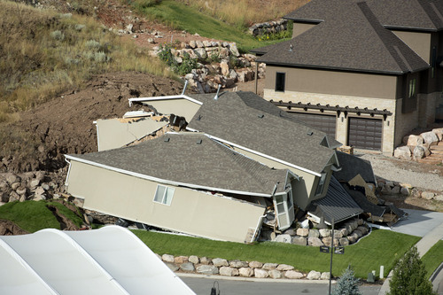 Jeremy Harmon  |  The Salt Lake Tribune

This home at 739 Parkway Drive in North Salt Lake was destroyed by a landslide early in the morning on Tuesday, August 5, 2014.