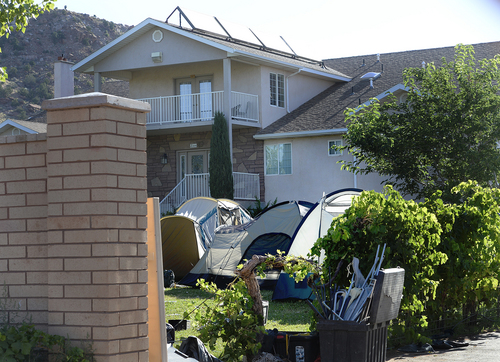 Scott Sommerdorf   |  The Salt Lake Tribune
A house on Homestead Street in Hildale had a number of tents set up in the yard. Later, a meeting was held at Mohave Community College in Colorado City to discuss the UEP distribution, Saturday, August 9, 2014.