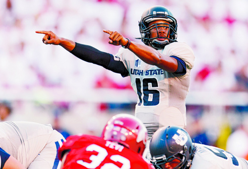 Trent Nelson  |  The Salt Lake Tribune
Utah State Aggies quarterback Chuckie Keeton (16) controlling the offense on a touchdown drive as the University of Utah hosts Utah State, college football Thursday, August 29, 2013 at Rice-Eccles Stadium in Salt Lake City.