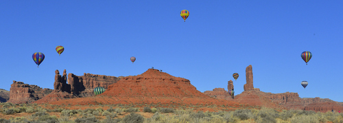 Keith Johnson | The Salt Lake Tribune

Hot air balloons fly over the Valley of the Gods in Southeastern Utah on the last day of the16th annual Bluff Balloon Festival outside Bluff, Utah January 19, 2014.