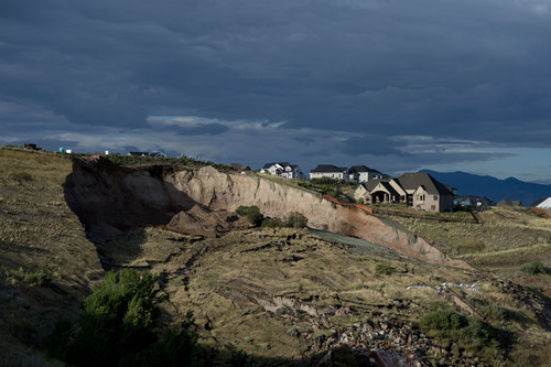 Jeremy Harmon  |  The Salt Lake Tribune

This hillside gave way early in the morning and destroyed a home at 739 Parkway Drive in North Salt Lake on Tuesday, August 5, 2014.