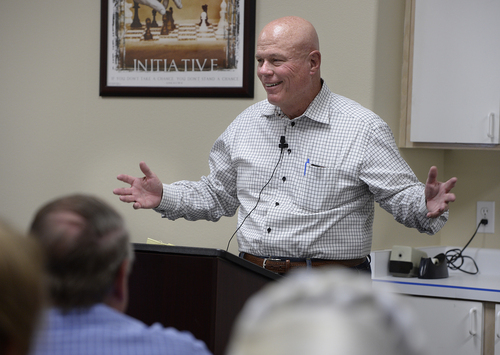 Scott Sommerdorf   |  The Salt Lake Tribune
UEP fiduciary Bruce Wisan addresses an overflow crowd of about 90 people packed into a small meeting room at Mohave Community College in Colorado City to discuss the UEP distribution, Saturday, August 9, 2014.