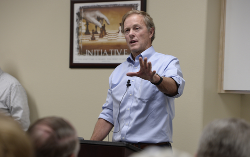 Scott Sommerdorf   |  The Salt Lake Tribune
UEP attorney Jeff Shields speaks at a meeting held at Mohave Community College in Colorado City to discuss the UEP distribution, Saturday, August 9, 2014.