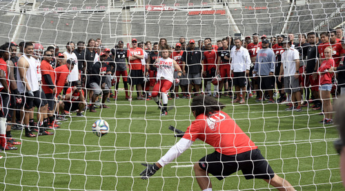 Al Hartmann  |  The Salt Lake Tribune 
Ute football players take soccer penalty kicks after practice at Ute football camp Wednesday August 13, 2014.
