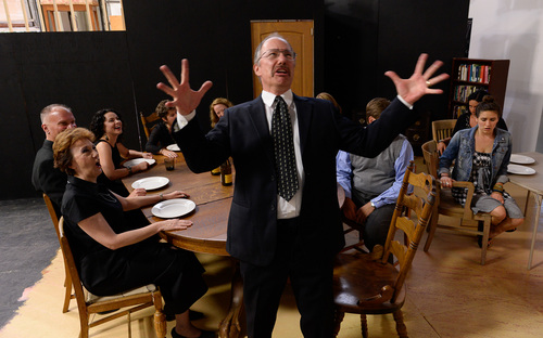 Francisco Kjolseth  |  The Salt Lake Tribune
Dark comedy explodes as Daniel Torrence acts out a scene where two companies, Silver Summit Theatre Company and Utah Repertory Theater Company have assembled the production of "August: Osage County," Tracy Letts' Tony winning play, which was made into a film last year staring Meryl Streep and Julia Roberts. It's an ambitious show with a large cast of SLC's "all stars" and a big set, in a new theater space by two "emerging" companies.