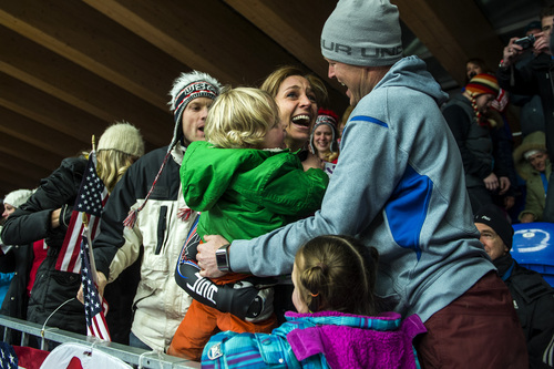 Chris Detrick  |  Tribune file photo
Noelle Pikus-Pace celebrates with her family; son Traycen, 2, daughter Lacee, 6, husband Janson, right, and her brother Jared Pikus after winning the silver medal in the women's skeleton competition at Sanki Sliding Center during the 2014 Sochi Olympics Friday February 14, 2014. Pikus-Pace finished with a time of 3:53.86.