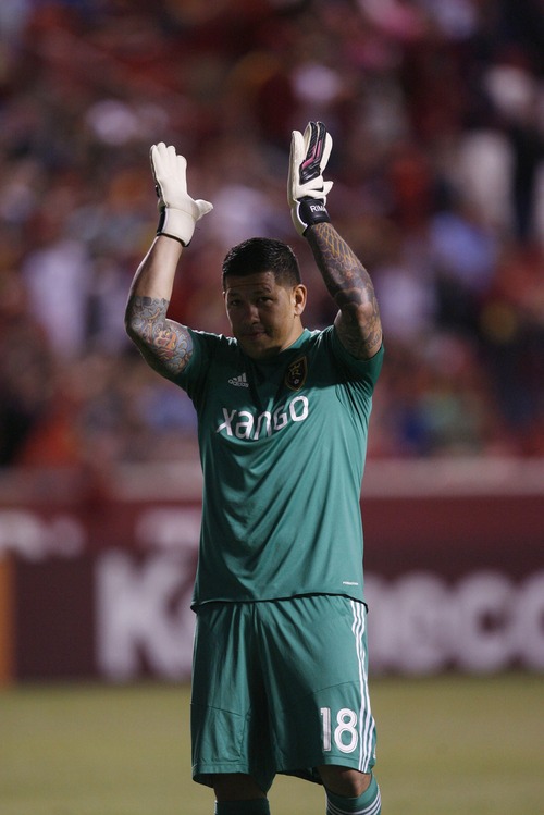 Francisco Kjolseth  |  The Salt Lake Tribune
Real Salt Lake goalkeeper Nick Rimando puts his hands together in celebration of their win over the San Jose Earthquakes on Saturday, June 1, 2013 at Rio Tinto Stadium in Sandy.