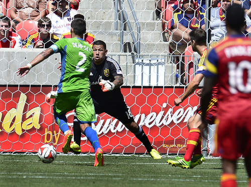 Scott Sommerdorf   |  The Salt Lake Tribune
RSL GK Nick Rimando made the initial save on this Clint Dempsey rush, but the rebound was put in for Seattle's lone goal. RSL defeated the Seattle Sounders 2-1 at Rio Tinto Stadium, Saturday, August 15, 2014.