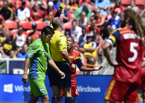 Scott Sommerdorf   |  The Salt Lake Tribune
Joao Plata is given a yellow card after a dangerous play on a header during first half play. RSL defeated the Seattle Sounders 2-1 at Rio Tinto Stadium, Saturday, August 15, 2014.