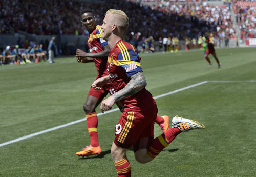 Scott Sommerdorf   |  The Salt Lake Tribune
RSL forward Luke Mulholland runs to the corner after his shot gave RSL a 2-0 lead early in the second half. RSL defeated the Seattle Sounders 2-1 at Rio Tinto Stadium, Saturday, August 15, 2014. The goal was listed as an "own goal" on Seattle's Osvaldo Alonso.