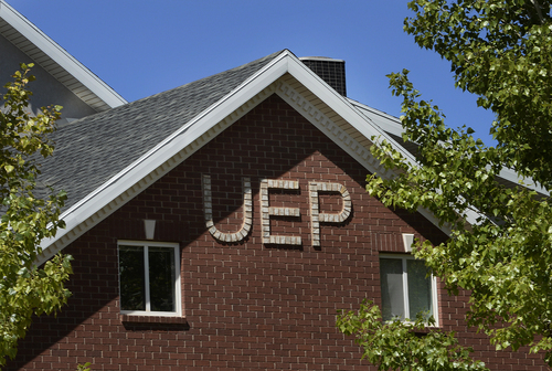 Scott Sommerdorf   |  The Salt Lake Tribune
A home in Hildale, Utah, is adorned with bricks spelling out UEP, Saturday, August 9, 2014.